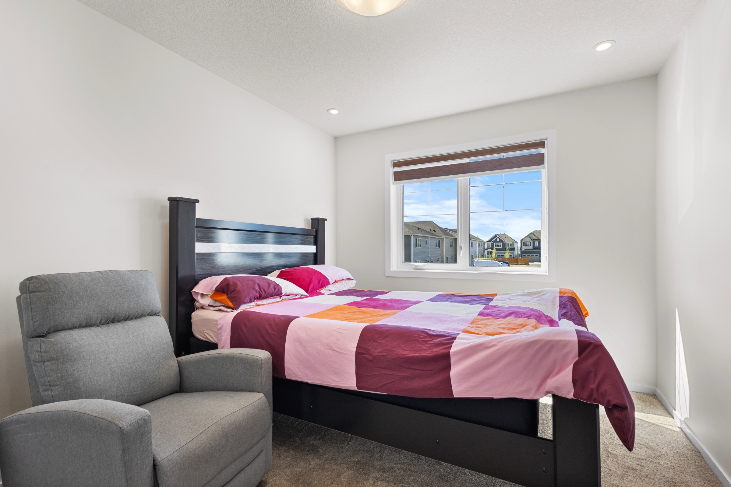 Third bedroom showing the full room and window wall